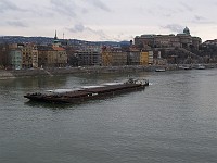  Barge travelling down the river Danube. Royal Palace visible on the right