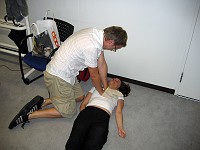  Andreas simulates CPR on Paula