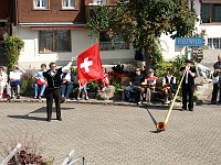  Some guys waving Swiss flags and blowing alp horns were also included as part of the entertainment. Apparently it wasn't just waving of flags, it was tossing of flags, which is a sport in these parts.