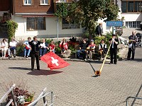  Some guys waving Swiss flags and blowing alp horns were also included as part of the entertainment. Apparently it wasn't just waving of flags, it was tossing of flags, which is a sport in these parts.