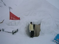  Lynn poses outside the igloo