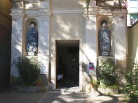  A secluded church along the waterfront with interesting figurines outside