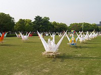  The cranes built by the boy scouts were placed near the atomic bomb museum. Lights were placed underneath them for the evenings.