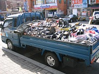  Brings a new definition to the expression: fell off the back of a truck. This stuff was actually being sold from the back of a truck.