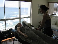  Lynn enjoys a massage in the new apartment