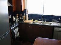  View after the entrance hall, looking directly across the kitchen