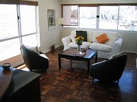  Standing next to the kitchen looking into the lounge