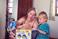  Ryan and Lynn open what is to be his favourite present - an automated bubble blowing machine...