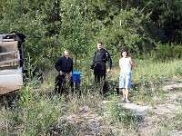  Preparing for the search and recovery dive in the small lake...