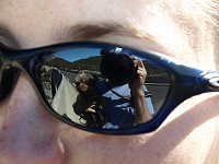  Reflection in sunglasses. Waiting on a bridge.