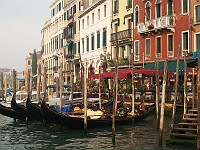  Gondolas parked outside a restaurant.