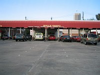  This is a 'drive-thru' bank. Customers do not need to get out of their cars, they communicate with the tellers via a speaker